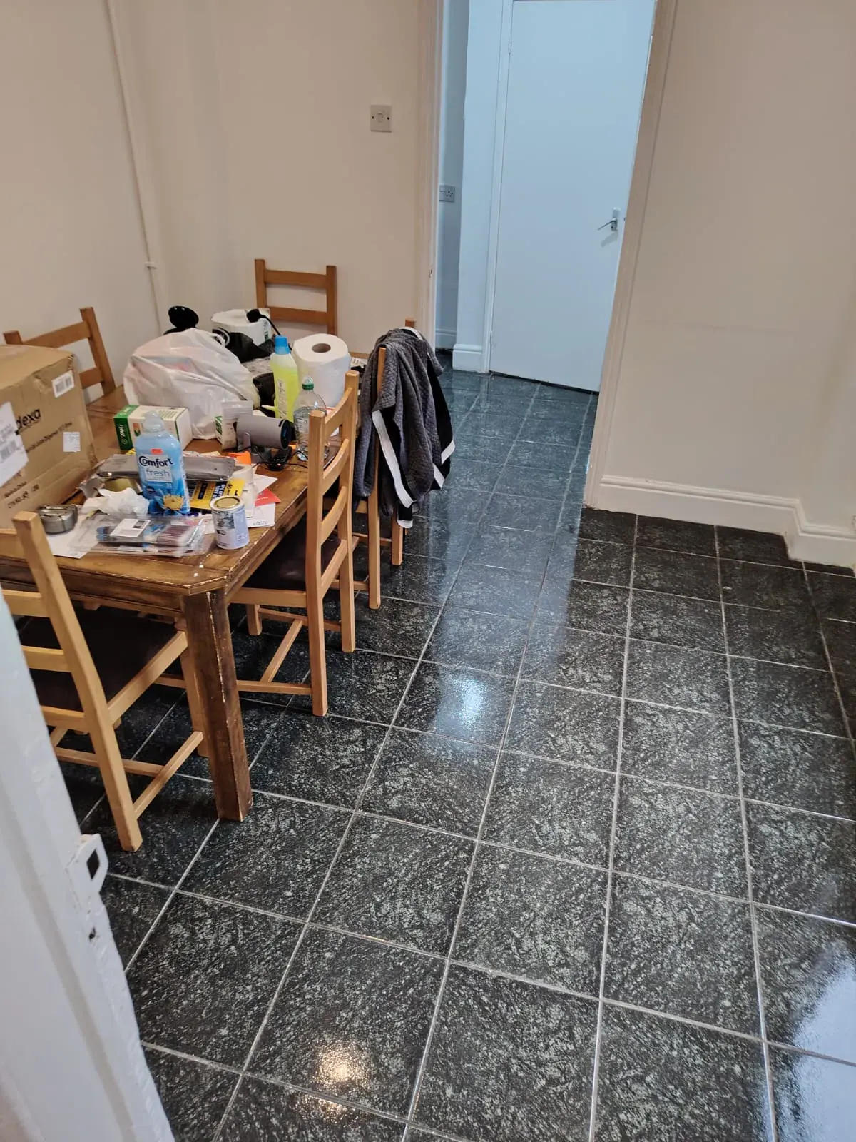 A tiled hall and dining area floor after a deep clean, Deep Cleaning in Birmingham