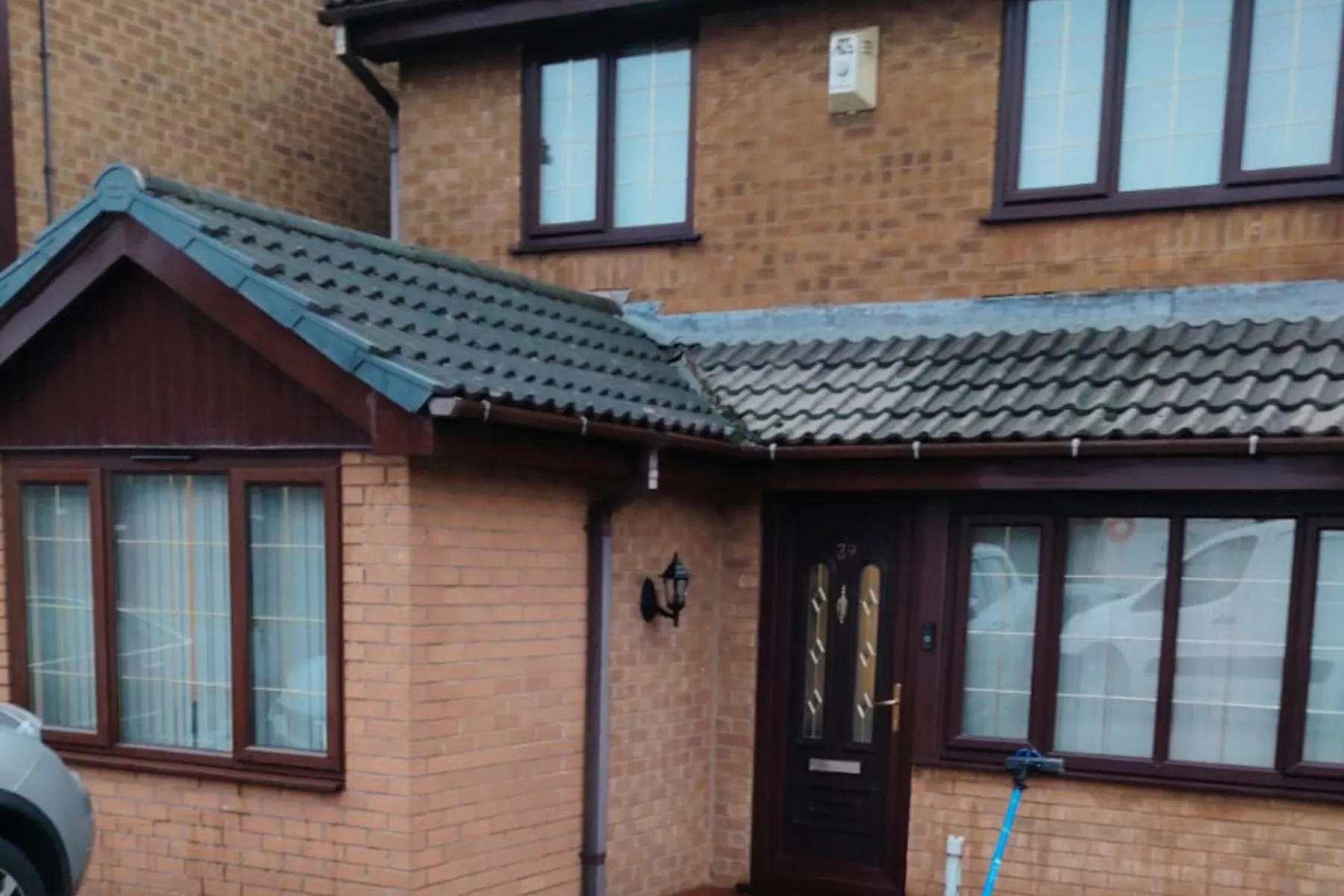 A porch and red front door with cleaned glass, Window Cleaning in Birmingham